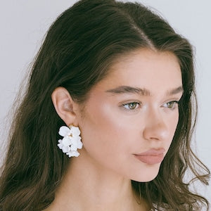 White porcelain flower drop dangle earrings with clustered petals