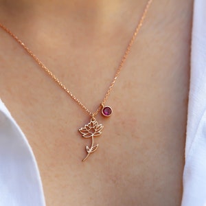 Rose gold-tone birth flower necklace with small round birthstone charm