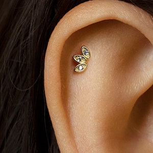 Butterfly stud earrings with tiny clear stone accents on silver post