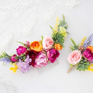 Colorful floral hair comb with pink, yellow, purple flowers and green foliage