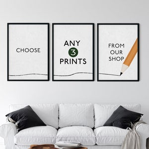 Set of three black-framed poster prints with 'Any 3 prints' text