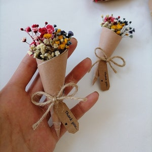 Mini dried flower bouquet favor in kraft cone with twine bow and thank-you tag