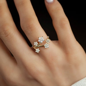 Gold diamond floral cluster ring with stacked flower design