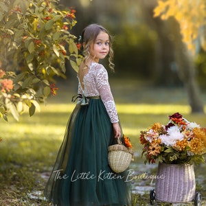 Olive green tulle flower girl dress with long-sleeve lace bodice and twirly skirt