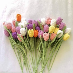 Handmade crochet tulip bouquet with multicolor flowers and green stems