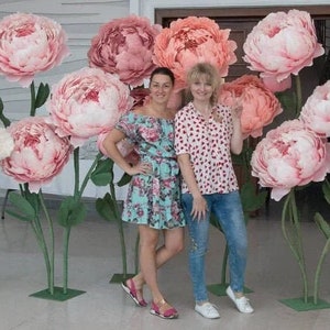Large pink crepe paper peonies on triple stems for home and event decor