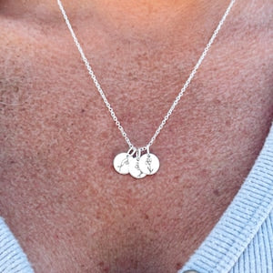 Silver-tone birth flower disc necklace with two small round pendants