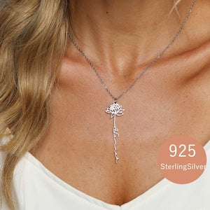 Sterling silver necklace with small birth flower charm on a fine chain