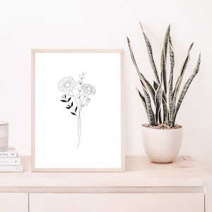 Minimalist framed botanical line art print of a wildflower bouquet on white