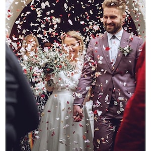 Biodegradable dried flower wedding confetti, scattered multicolor petals for tossing