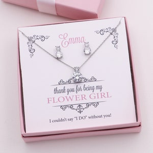 Silver flower girl jewelry set with crystal pendant and matching dangling earrings