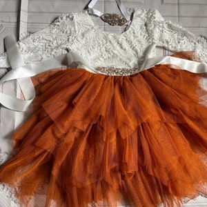Burnt orange lace long-sleeve tutu dress with floral top and tulle skirt