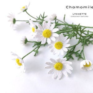 Crochet chamomile flower set, white daisy petals with yellow centers and green stems