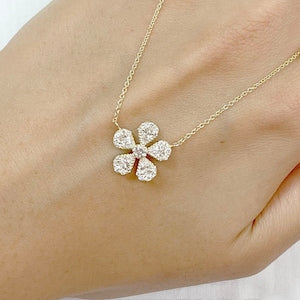 14k gold diamond flower pendant necklace with round-cut stones on a delicate chain