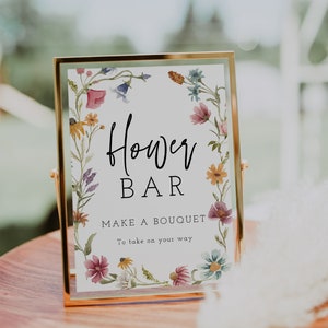 Framed floral sign reading 'Flower Bar' and 'Make a bouquet'