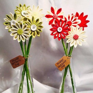 Artificial flower vase arrangement set with red, white, and green paper blooms