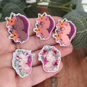 Set of 5 cartoon floral womb-themed brooch pins with pink and orange flowers