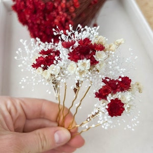 Burgundy dried flower hair pins with white accents on gold tone stems