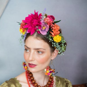 Colorful flower headband with fuchsia and pink blooms, worn as a hair crown