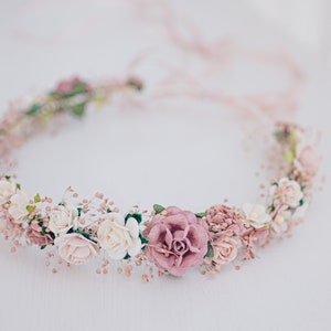 Dusty pink floral head wreath with small baby's breath and rose-style blooms