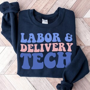 Navy crewneck sweatshirt with "LABOR & DELIVERY TECH" graphic