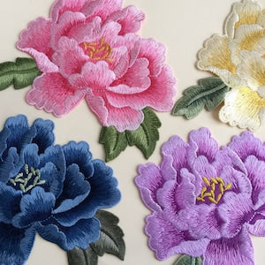 Embroidered peony flower sew-on patch set with pink, blue, purple blooms and leaf details