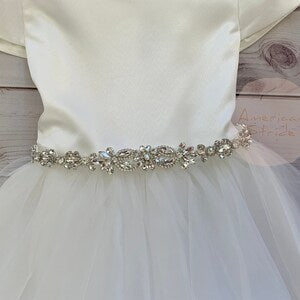Rhinestone flower motif sash belt on white satin ribbon