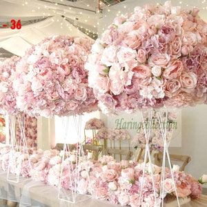 Blush pink artificial flower ball centerpiece wreath with layered rose blooms