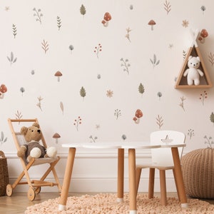 Pastel botanical wall stickers with leaves, flowers, and small mushroom shapes