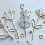 Knitted rope wire wildflower wall decor, cream stems with small leaf and petal details
