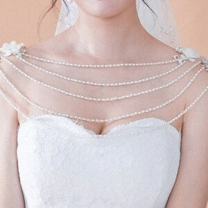 White floral pearl and diamante cape topper with layered bead strands