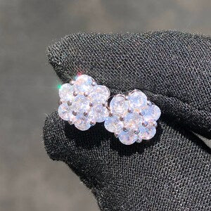Silver-tone flower cluster stud earrings with sparkling rhinestones