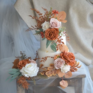 Fall cake topper flowers in burnt orange, terracotta, white and blush with greenery