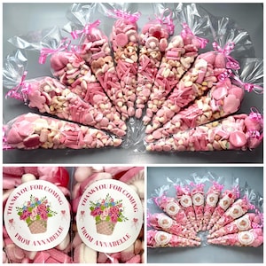 Pink pre-filled party sweet cones with floral topper bunch, arranged in a set