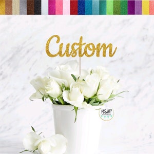 Personalized flower bouquet topper with white blooms and gold 'Custom' script lettering