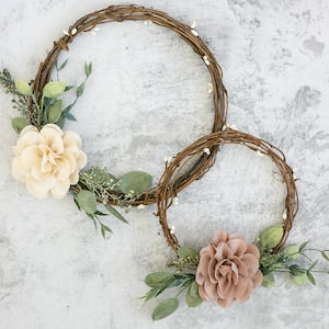 Rustic flower girl hoops with woven rings, cream and blush fabric flowers, green leaves