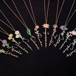 Gold-tone pendant necklace with small flower charms on linked chain, multiple designs