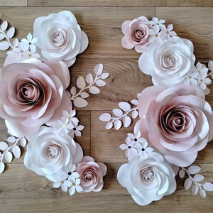 Set of pastel rose paper flowers with leaf and blossom cutouts