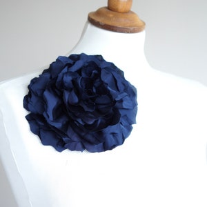 Dark blue fabric flower brooch pin with layered round petals