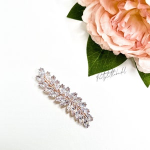 Rose gold rhinestone hair clip with three glittering rows