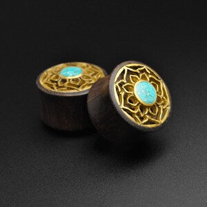 Wooden double-flare ear plug with brass lotus inlay and turquoise center