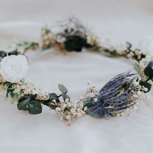 White rose and eucalyptus flower crown with dried blue thistle accents