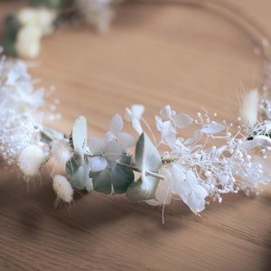 Dried white flower crown with eucalyptus leaves and baby's-breath sprigs