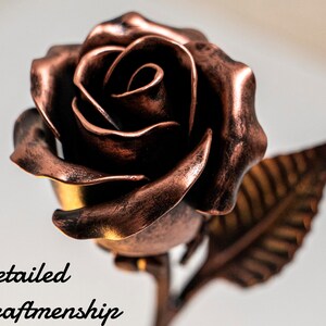 Handcrafted copper rose metal ornament with curled leaves