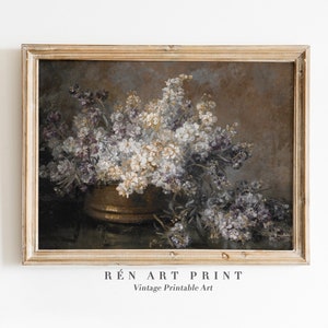 Framed vintage floral wall art print with pale blossoms in dark-toned vase