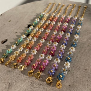 Flower bead bracelets with colorful beads and gold clasp ends