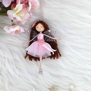 Handmade ballerina fairy doll with pink tulle skirt and dark hair, hanging ornament