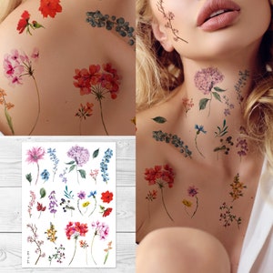 Watercolor floral temporary tattoos with wildflowers, branches, and leaves on skin and sheet