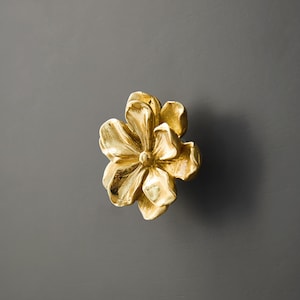 Gold brass flower drawer knob with petal relief, round base for cabinet doors