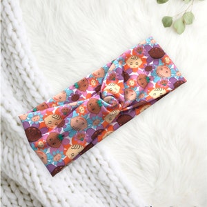 Baby headband with button, colorful retro flower and character print fabric